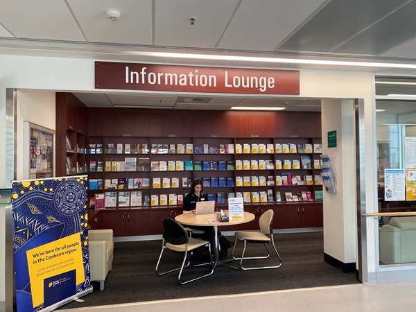 The information lounge, showcasing a seating area and a range of pamphlets