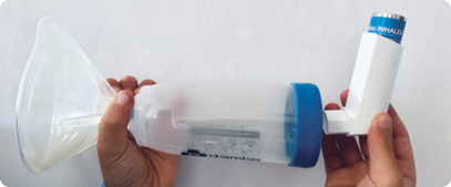 Image showing a mask and puffer correctly attached to a spacer.