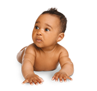 A two month old baby is crawling across the ground.
