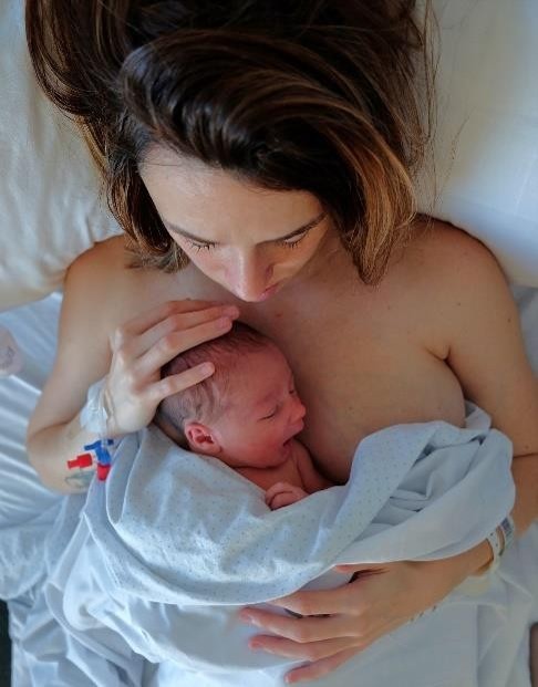 Mother with skin to skin contact with new born